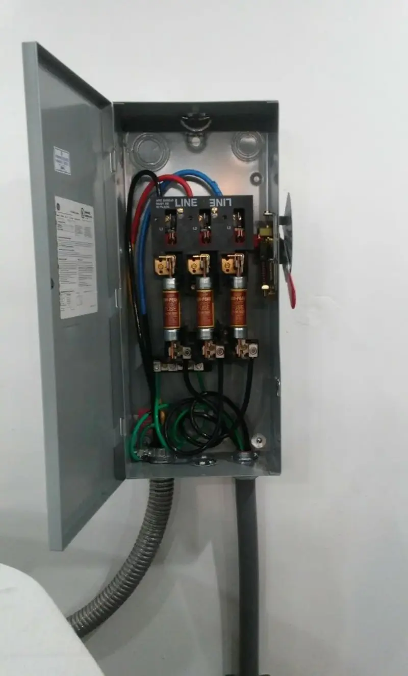 Three-phase disconnect switch installed for Smoke Detector Installation in Hayes